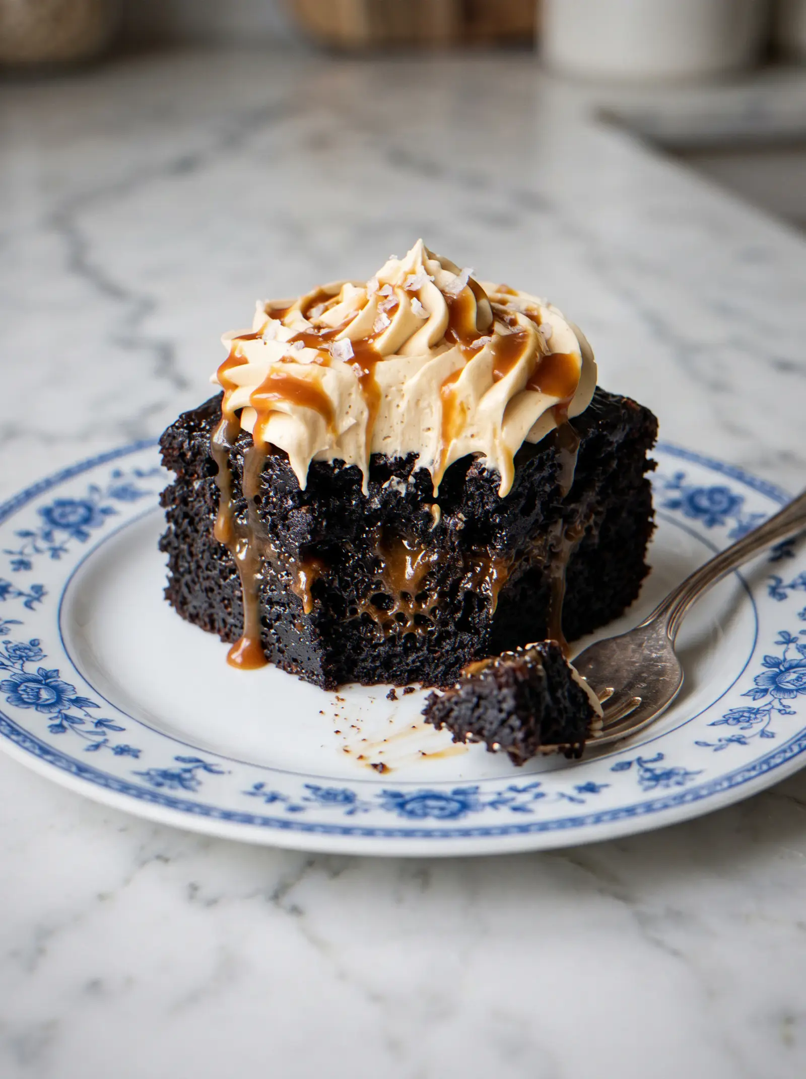 Close-up of molten chocolate sticky toffee pudding cake slice showing gooey caramel center and tender crumb